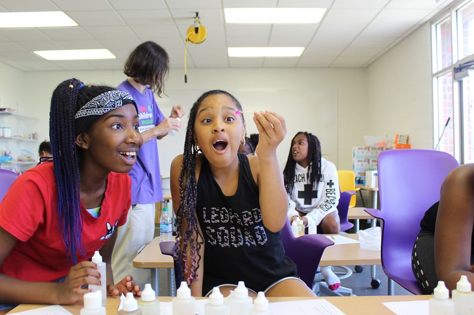 Two girls doing an experiment